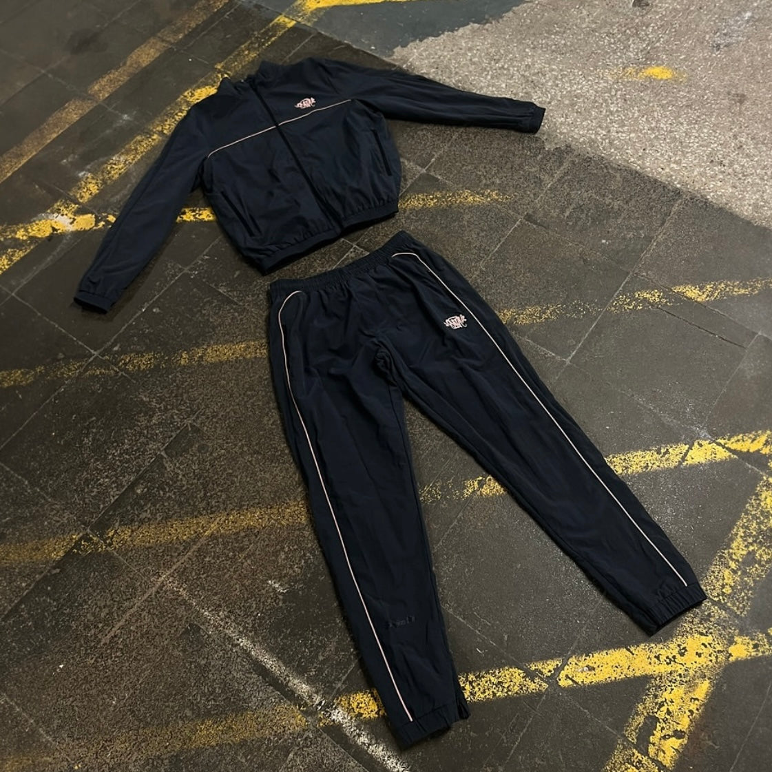 World Logo Shell Tracksuit - Black / Rose Gold